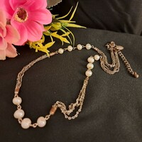Handmade cultured pearl necklaces.