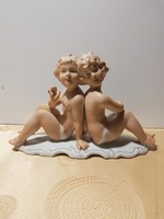 Beautiful porcelain children of a larger size, painted with rare thoroughness
