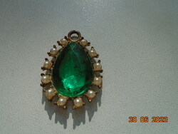 Older copper pendant inlaid with faceted green stone and pearls