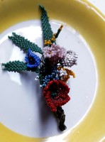 Old flower bouquet brooch made of small pearls