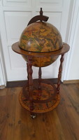 Antique-looking, globe-shaped rolling drink holder, bar cabinet