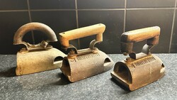 3 old industrial irons