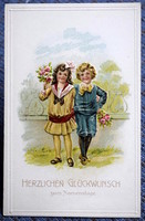 Antique embossed name day greeting litho postcard for children with a bouquet of roses