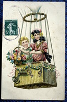 Antique embossed greeting card in children's balloon basket