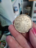Silver coin with Chinese zodiacs