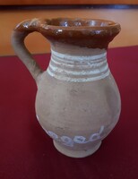 Unglazed ceramic small jar