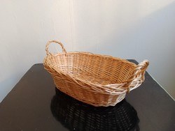 Old hand-woven cane fruit and bread storage basket with ears