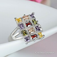 + Video-luxury ring, with a beautiful multi-colored zirconia stone, the ring is silver.