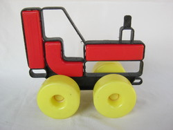 Retro plastic pulling toy tractor