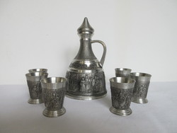 Old, marked tin pourer with 6 cups. Negotiable!
