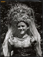 Larger size, photo art work by István Szendrő. Young woman in Mezőkövesd folk costume, dowry