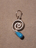 Spiral silver pendant with turquoise stones