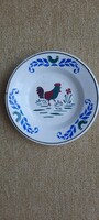 Small wall plate with a rooster