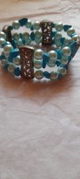 Bracelet with three rows of blue pearls
