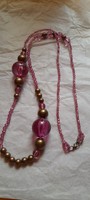 Purple-gold necklace with large plastic pearls