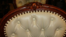 Four refurbished Viennese baroque chairs.