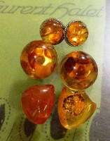 Three amber earrings