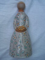 Ceramic figurine of Anna Berkovits marked with a maiden flower