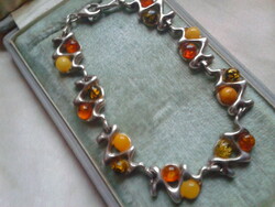 Designer silver bracelet with amber