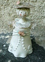 A female ceramic figure in the style of Zákány Ester