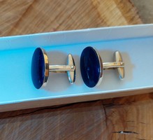 Old silver cufflink with deep blue lapis lazuli stone