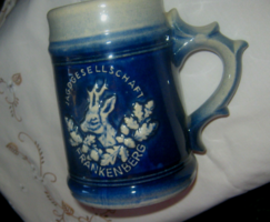 Ceramic jug with deer