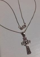 A marked silver necklace in good condition with a marked silver Celtic cross pendant