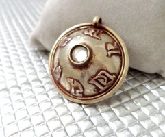 Antique pendant with symbols