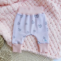 Baby shower, baby shower gift, pastel pink baby blanket, drawn hearts with patterned baby pants