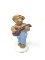 Rrr! Aquincum Budapest porcelain figurine - a Vietnamese boy playing the mandolin