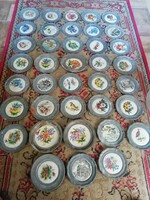 There are 38 decorative plates in the condition shown in the pictures