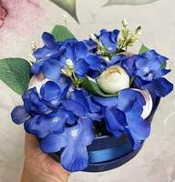 Wonderful blue flower box with silk flowers