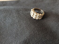 Old ring with many stones