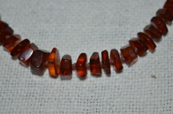 Amber necklace with polished eyes