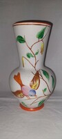 Old porcelain vase with birds