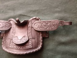 Action figure, saddle for Big Jim and Barbie horses