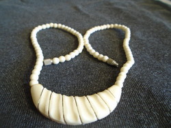 Old, exotic bone art deco necklace. That is, collier from the 1980s, mature African handcrafted jewelry