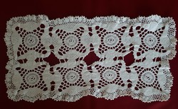 Crocheted lace tablecloth consisting of 8 stars