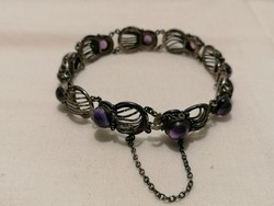 Old silver bracelet with stones