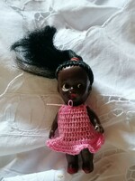 Trafficked Negro doll, with long black hair, from the sixties