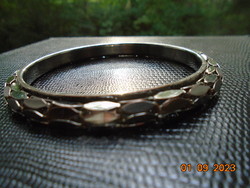 Mesh-like pierced rope silver-colored bracelet