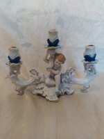 Antique porcelain candle holder with three prongs
