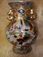 A richly gilded Chinese vase with ducks
