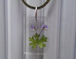 Resin block pendant with dried leaves and flowers