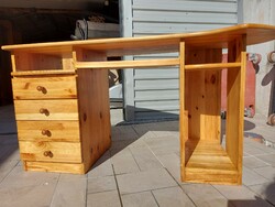 For sale is a pine desk with 4 drawers and 2 pull-out shelves.