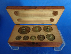 Antique scale weights in box