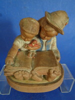 Careful ceramics, a pair of figurines