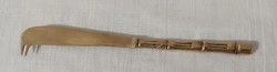 Old brass cheese knife