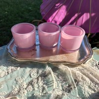 3 pink thick-walled candle holders with glass tray