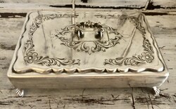 A beautiful jewelry box with a fine pattern in antique silver
